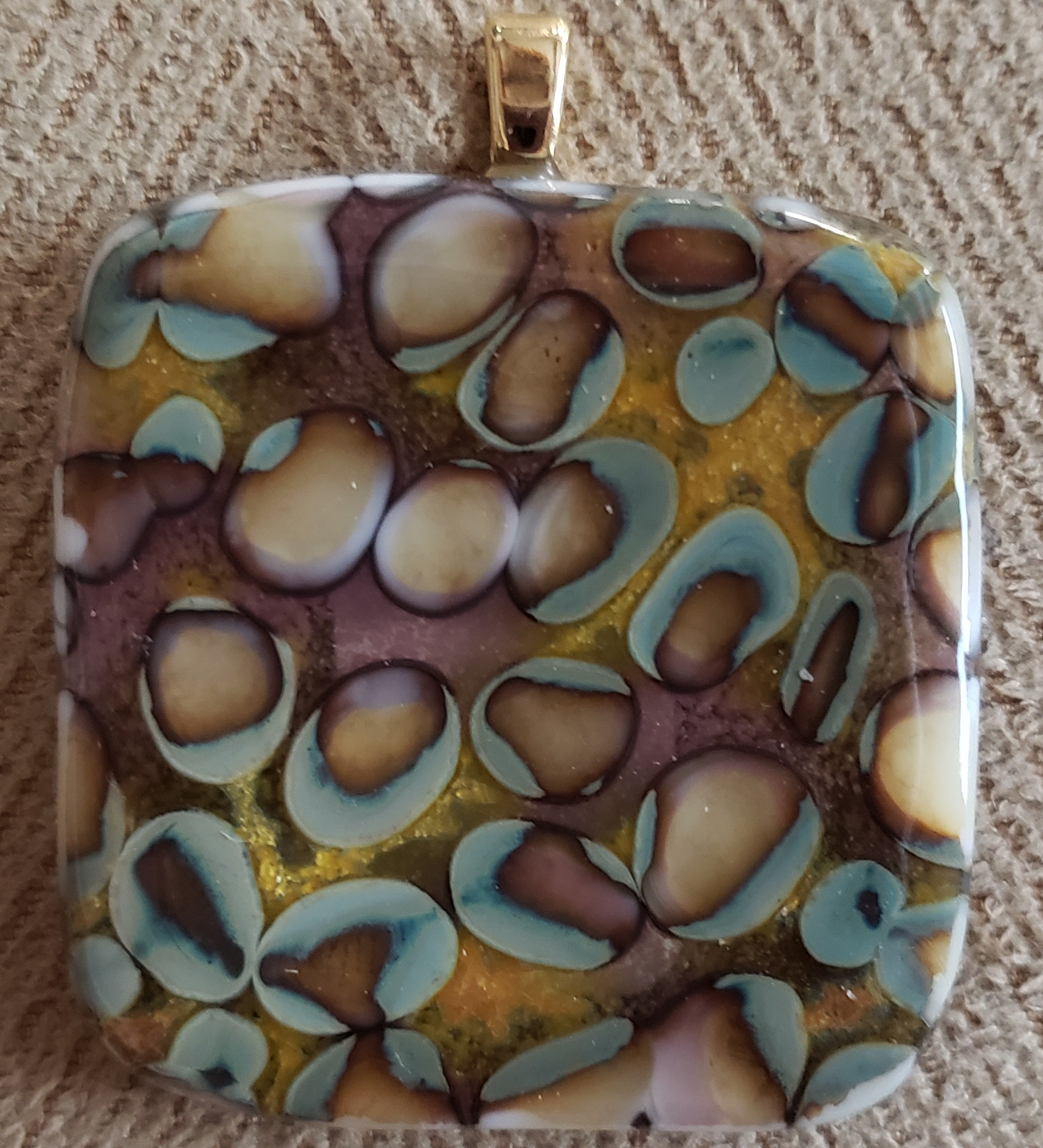 abstract pendant handcrafted in glass in the USA