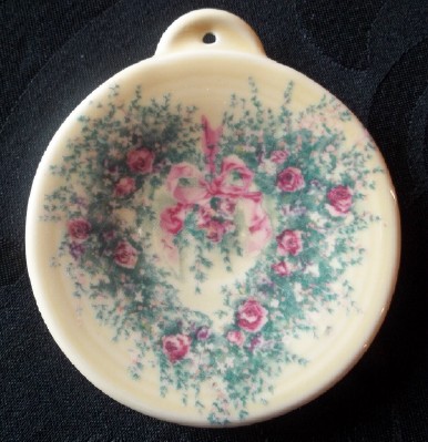 vintage floral heart design fired on glazed pottery