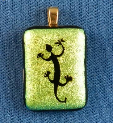 dichroic glass pendant with etched lizard petroglyph